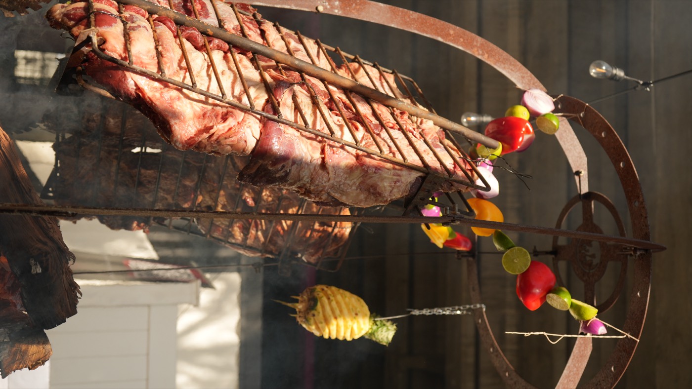 Asado on the cross with fire-roasted pineapple