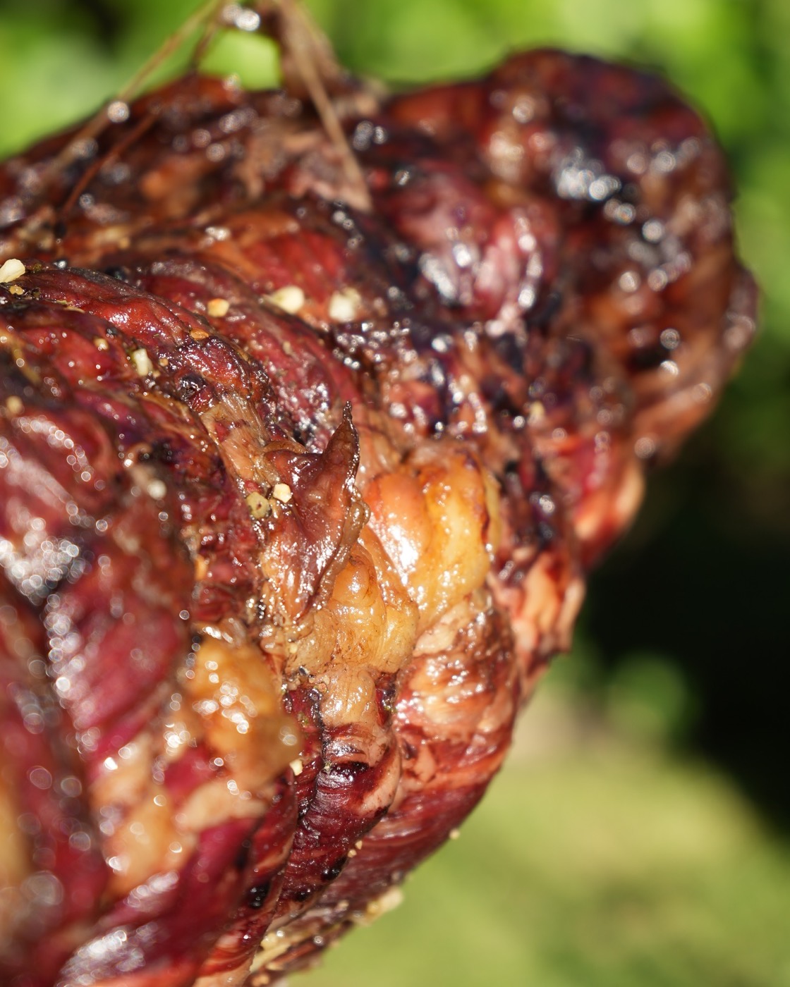 Ribeye cooking on the cross